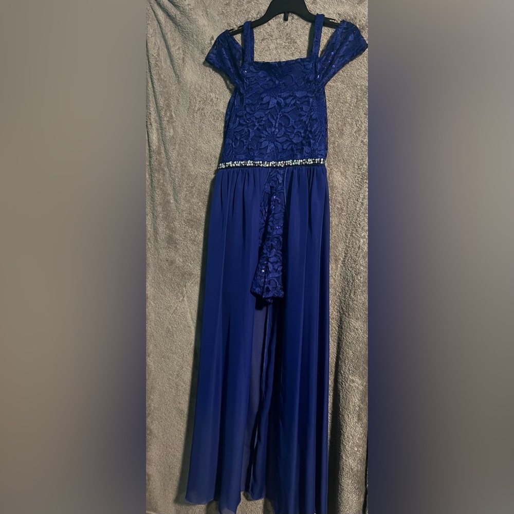 Sleeveless Blue dress with shorts .